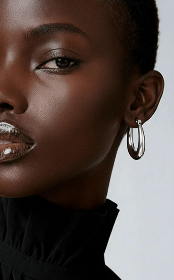 Élégance argentée – Créoles ovales 28x5 mm en acier inoxydable - Alberto Bijoux