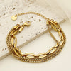 Bracelet doré pour femme composé de plusieurs chaînes structurées, au style audacieux et tendance – Alberto Bijoux