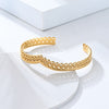Manchette bangle dorée pour femme avec design dentelle ajourée, au style raffiné et bohème chic – Alberto Bijoux