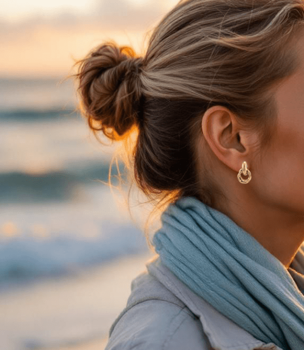 Charme doré – Boucles d’oreilles anneaux entrelacés 27x17 mm - Alberto Bijoux