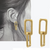 Boucle d’oreille dorée en acier avec deux maillons décalés – modèle Twist’n’Link