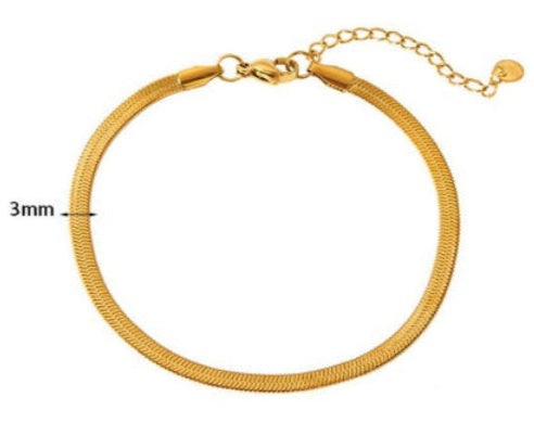 Bracelet doré 18k en maille serpent de 3 mm avec chaînette d’extension, longueur 17 + 3 cm.
