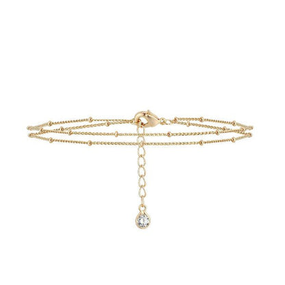 Clarté – Bracelet double Chaîne Doré avec Goutte Brillante - Alberto Bijoux