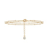 Bracelet triple chaîne doré pour femme avec goutte brillante suspendue, au style raffiné et lumineux – Alberto Bijoux