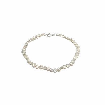 Bracelet petites perles baroques d'eau douce 5.75mm fermoir spring ring argent 7.5 pouces blanc nacré