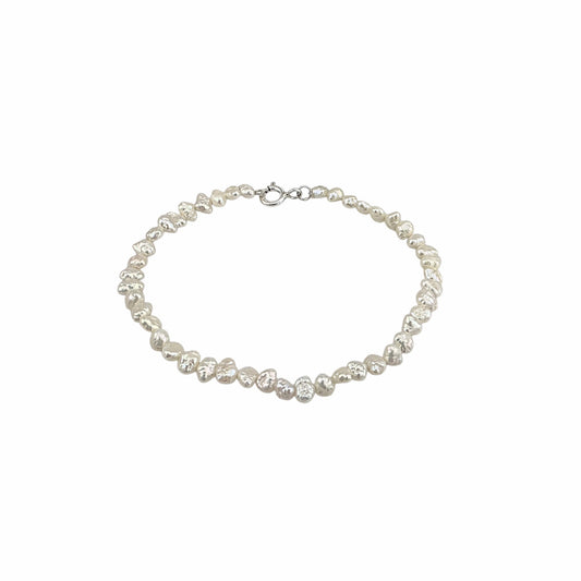 Bracelet petites perles baroques d'eau douce 5.75mm fermoir spring ring argent 7.5 pouces blanc nacré