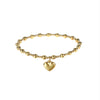 Bracelet élastique pour femme composé de perles dorées et orné d’un pendentif cœur. Un bijou mignon et symbolique signé Alberto Bijoux, facile à porter au quotidien.