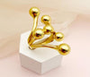 Bague dorée sculpturale avec design bulles, disponible en tailles 7, 8 et 9