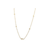 Collier doré minimaliste avec petites croix horizontales sur fond blanc