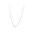 Collier doré minimaliste avec petites croix horizontales sur fond blanc