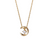 Collier doré avec pendentif en forme de lune et petite pierre brillante, présenté sur fond blanc