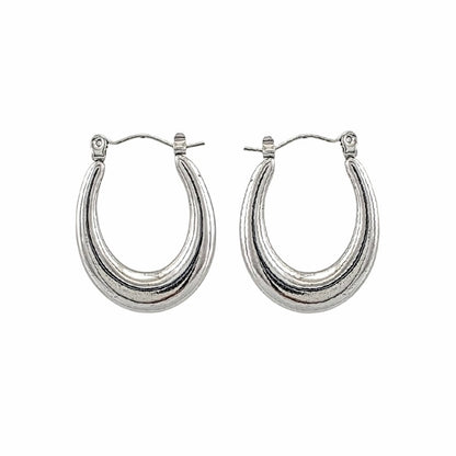 Boucles d’oreilles hypoallergéniques pour femme, format 20 x 26 mm.
