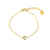 Bracelet doré fin avec pierre ronde rose au centre et chaîne ajustable