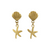 Boucles pendantes dorées en forme de coquillage et étoile de mer vue de face