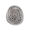 Bague argent sterling ovale creuse avec motifs spirales gravés, design tribal ajouré, style ancestral moderne