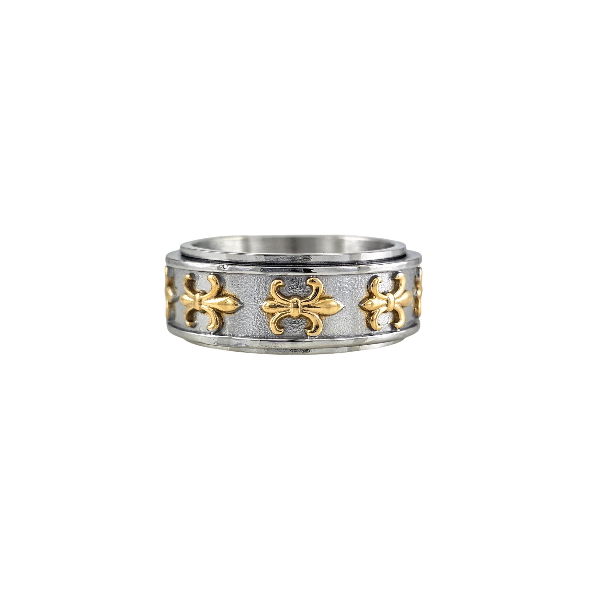 Two-tone stainless steel fleur-de-lis spinner ring with gold accents