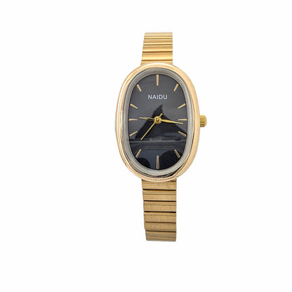 Montre femme ovale dorée cadran noir bracelet extensible doré vintage stretch