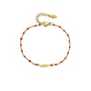 Bracelet perlé pour femme avec pendentif plume dorée, au style bohème chic et coloré – Alberto Bijoux